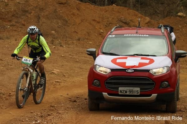 A racer talks to the medic