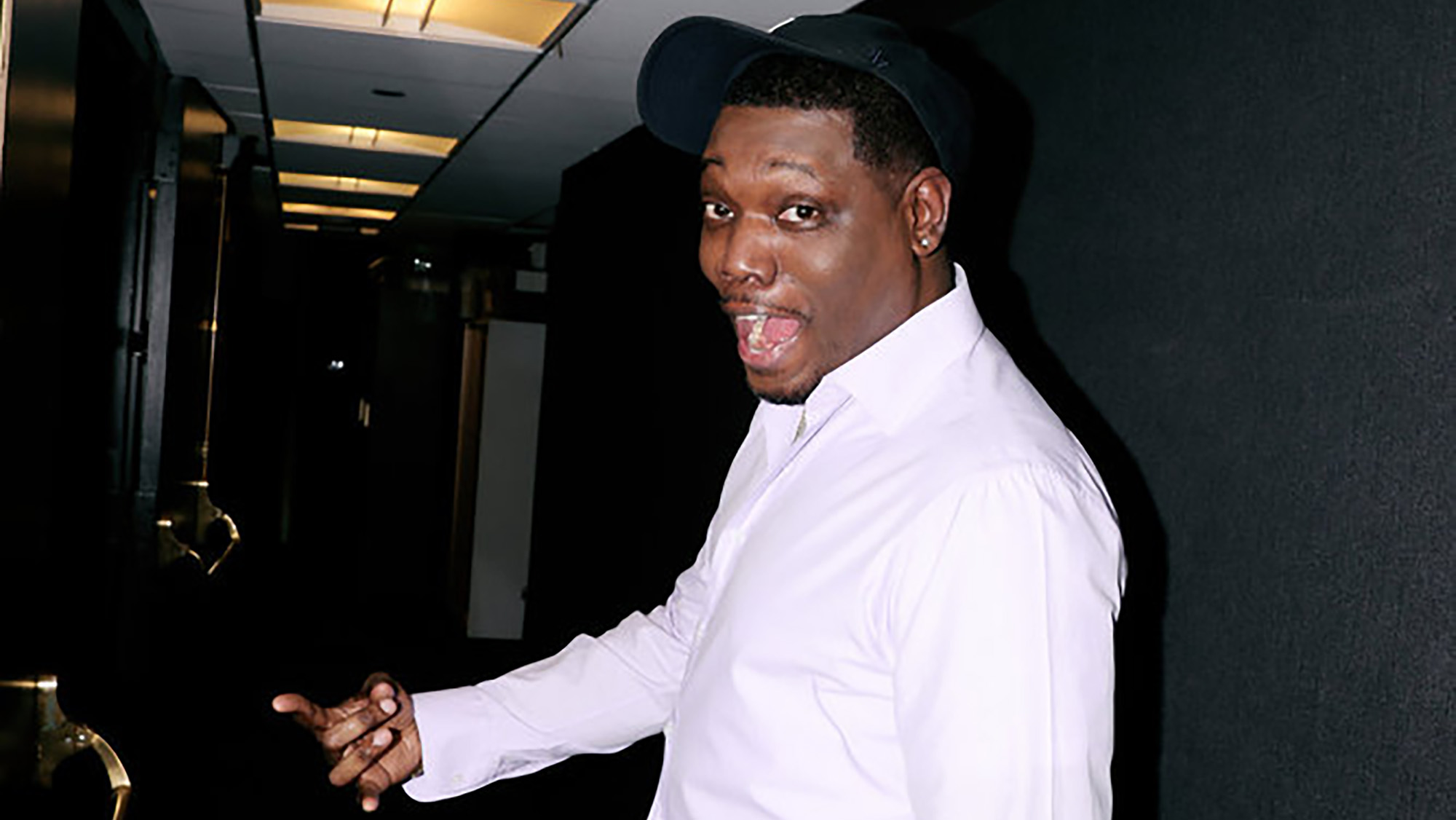 Michael Che seen in button down at 30 Rock behind-the-scenes ahead of October 10th Shane Gillis episode of SNL.