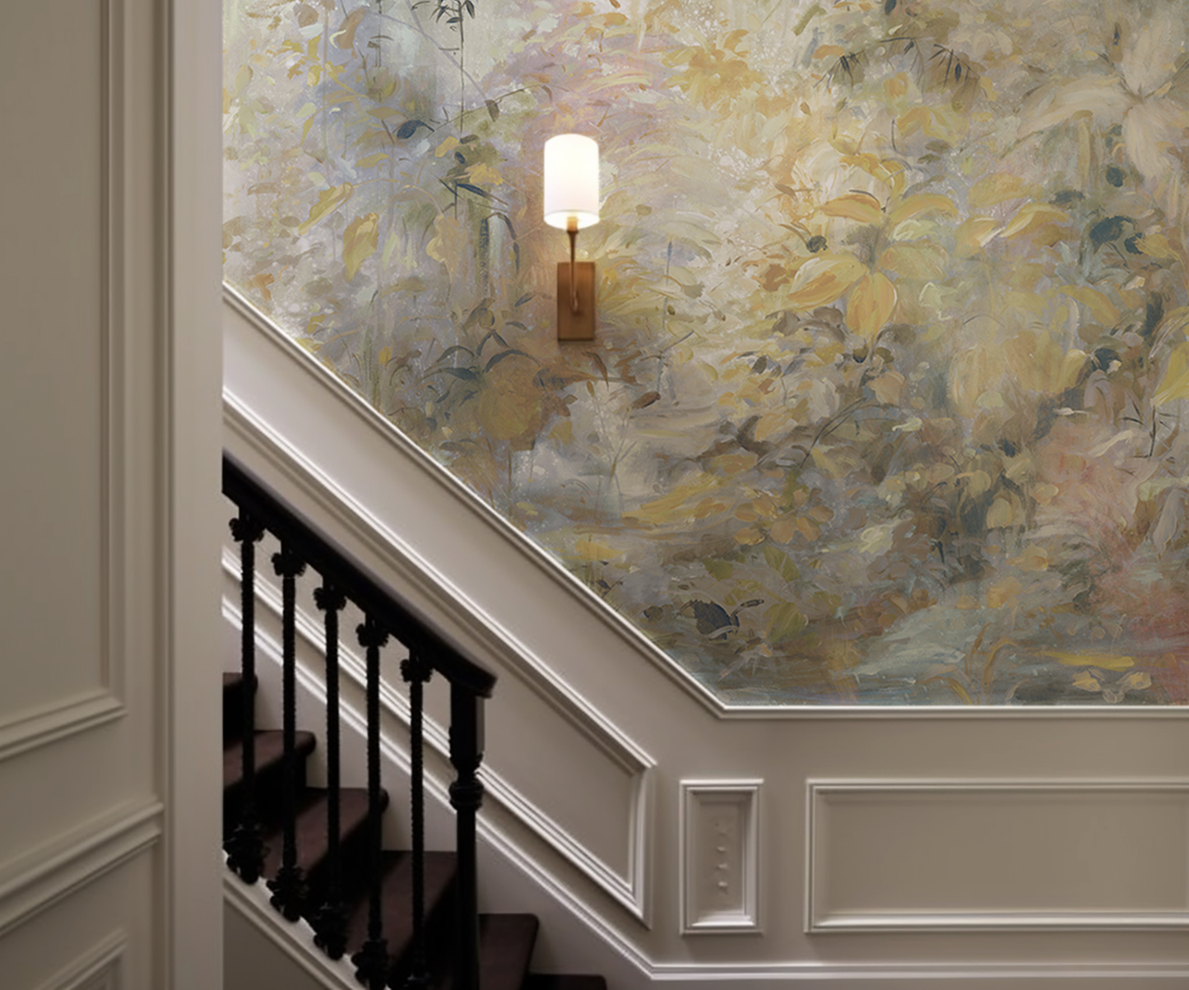 dark wooden stained staircase next to white panelled wall and wallpaper above