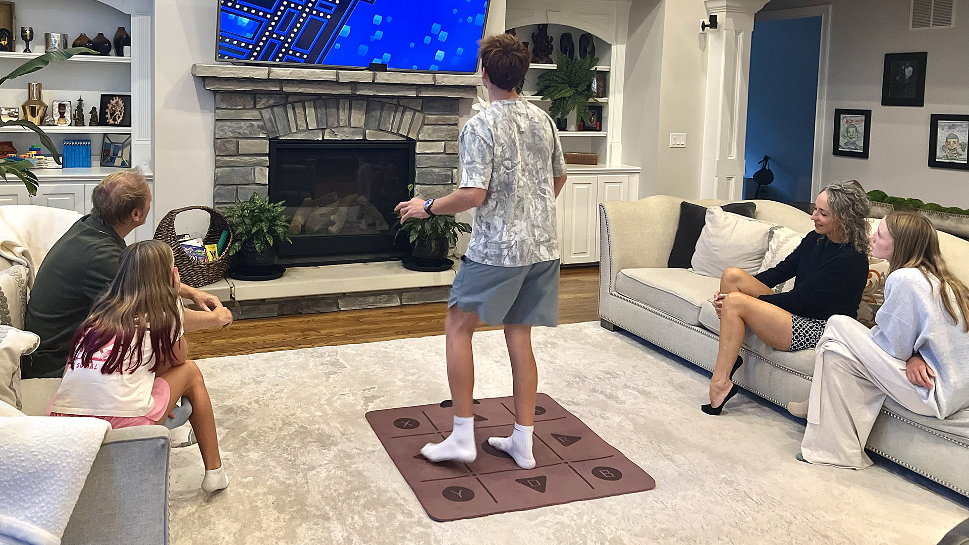 GAMR Play Pad &ndash; man playing game on the wireless dance mat