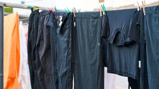 picture of black clothes on washing line