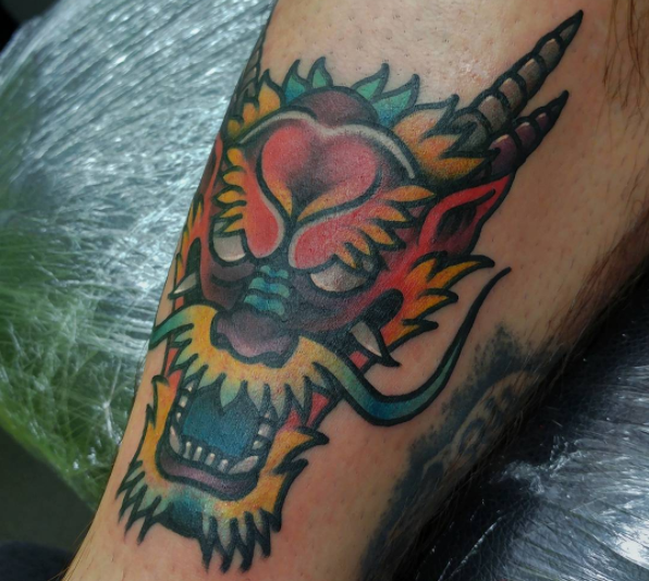 Symmetrical dragon tattoo