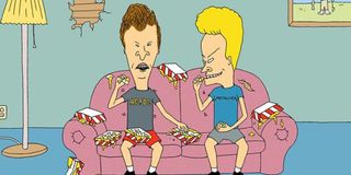 Beavis and Butthead on their iconic pink couch