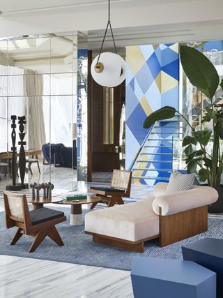 modern sitting room with contemporary blue and white artwork