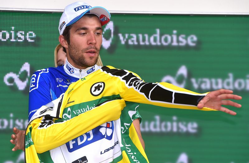 Thibaut Pinot (FDJ) pulls on the yellow jersey