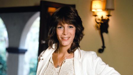 jamie lee curtis on a yellow background