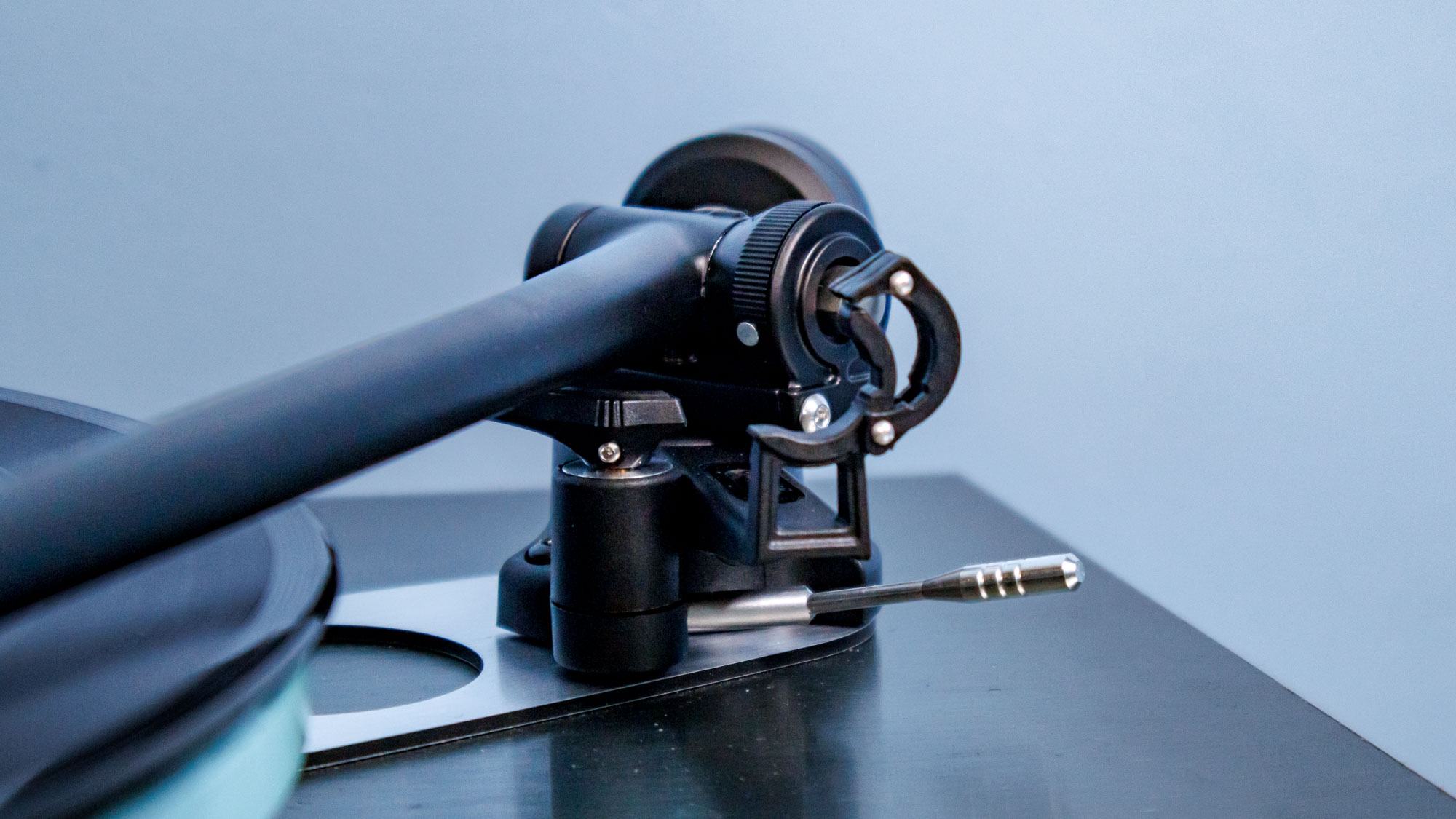 The Rega Planar 3 RS on an entertainment stand.