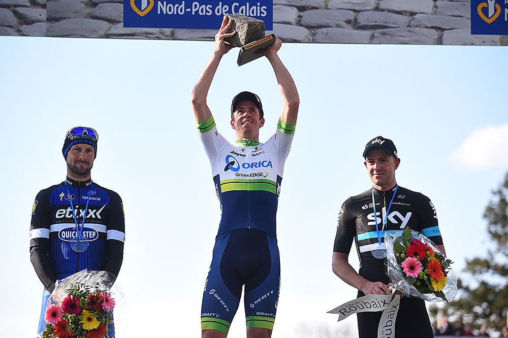 Mat Hayman holds aloft his trophy