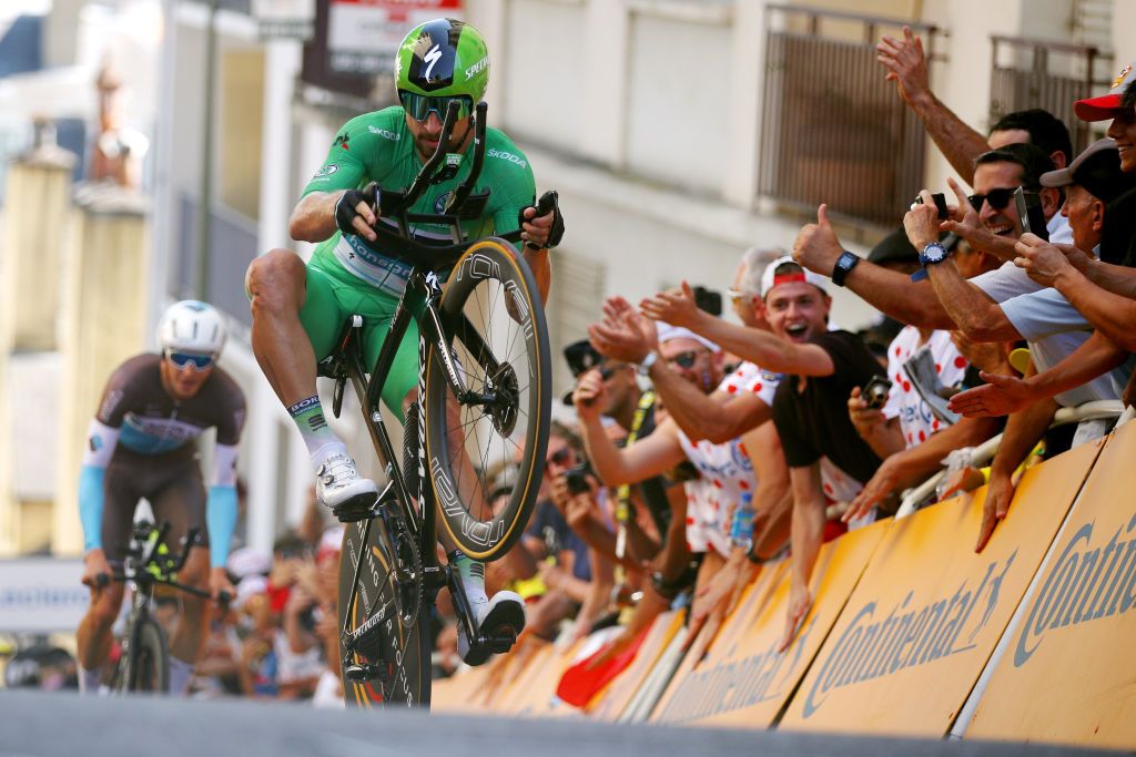 Peter Sagan showboats up the climb to the finish in Pau