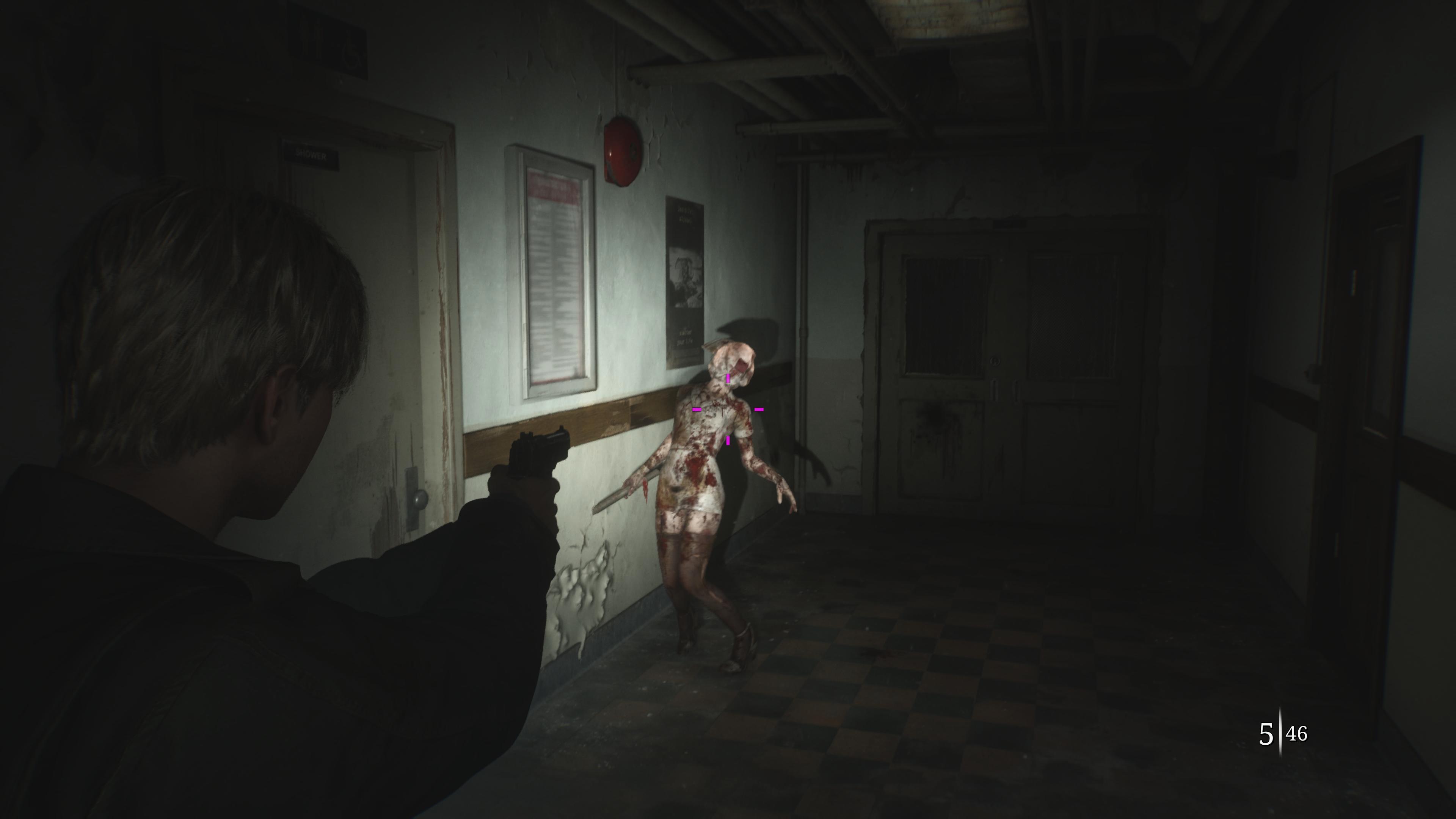 In the hospital in Silent Hill 2 remake, James Sunderland aims a revolver at an approaching bubble head nurse enemy