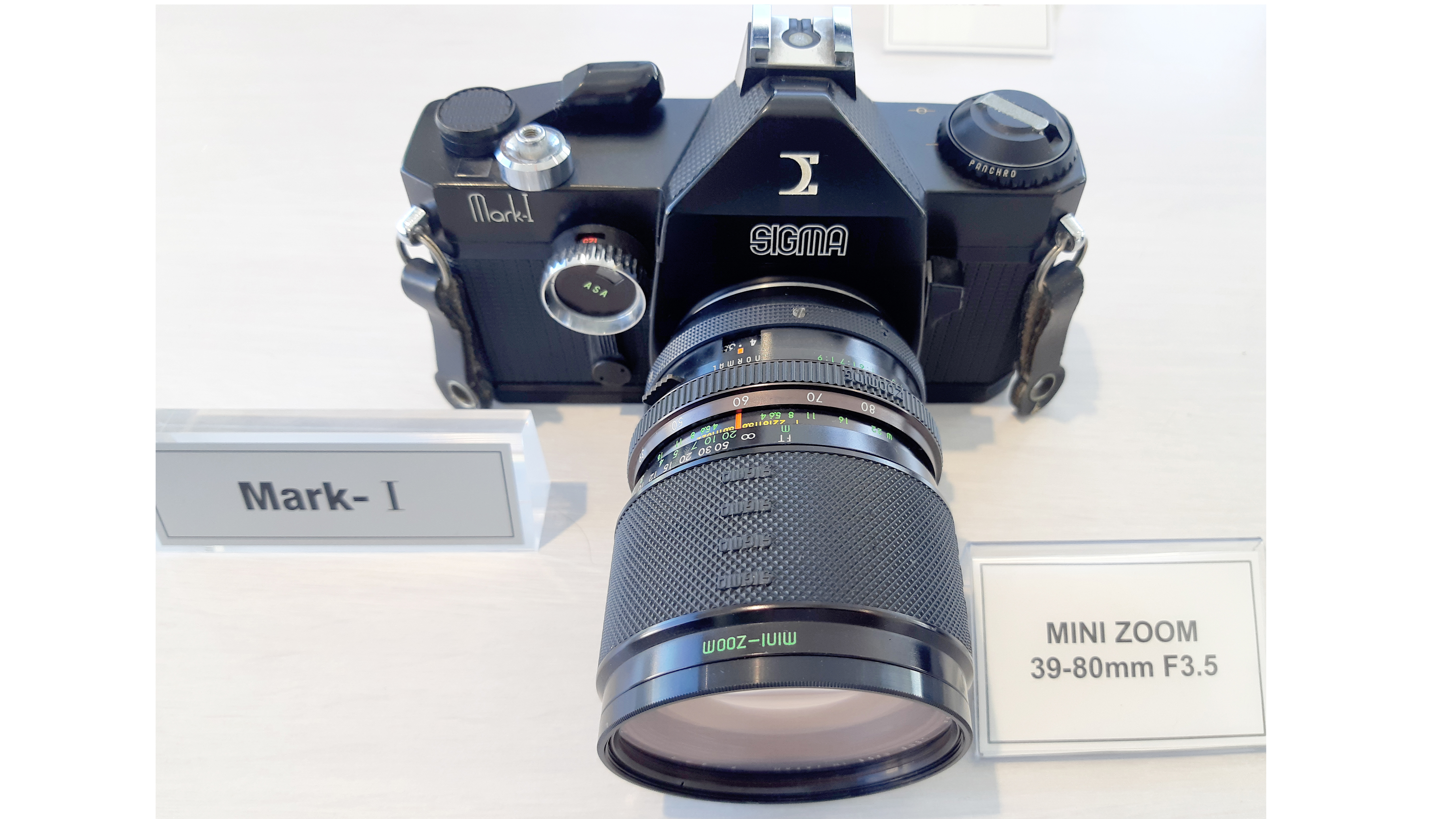 Sigma Mark-1 (1976). M42 screwthread mount 35mm SLR based on the Ricoh Singlex TLS. Manual exposure control with built-in CdS TTL metering.