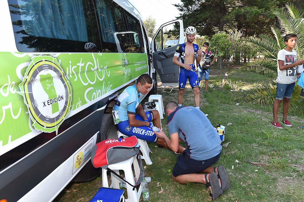 Rodrigo Contreras gets medical attention outside the team bus.