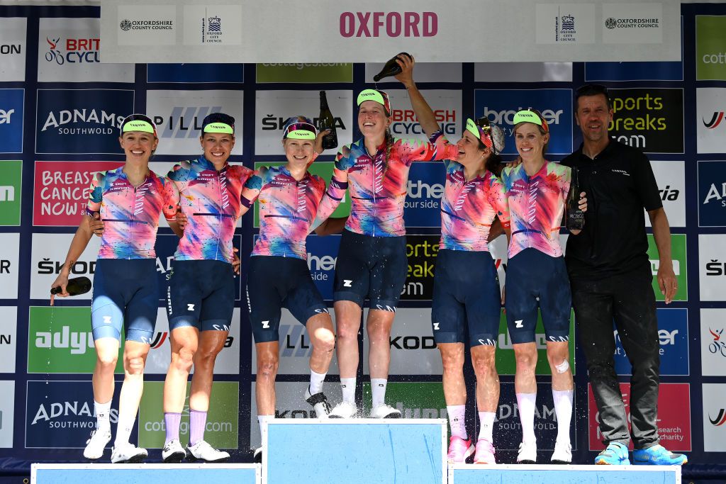 OXFORD ENGLAND JUNE 11 Katarzyna Niewiadoma of Poland Alice Barnes of United Kingdom Shari Bossuyt of Belgium Elise Chabbey of Switzerland Tiffany Cromwell of Australia Mikayla Harvey of New Zealand and Team CanyonSram Racing celebrate at podium as final best team winner after the 8th The Womens Tour 2022 Stage 6 a 1429km stage from Chipping Norton to Oxford WomensTour UCIWWT on June 11 2022 in Oxford England Photo by Justin SetterfieldGetty Images