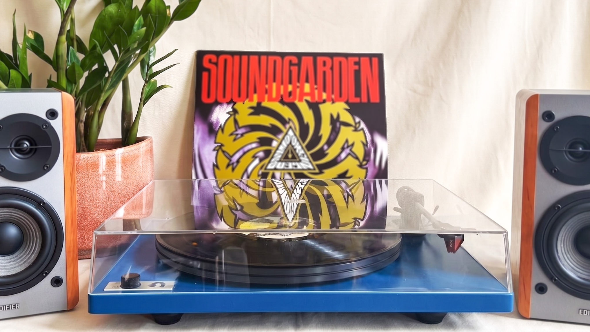 the u-turn audio orbit special turntable with edifier r1280t speakers and a soundgarden record