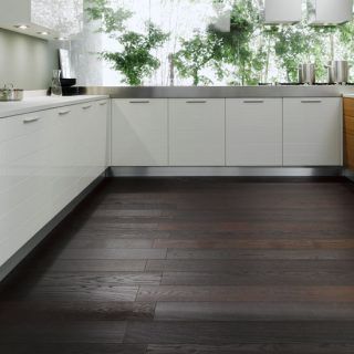 kitchen room with gas stove and kitchen cabinets