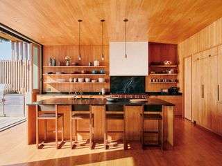 kitchen at the Surf House, looking tactile and bright with wood panelling