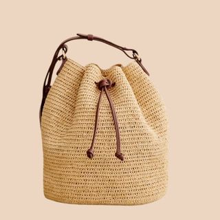 Flat lay image of raffia bag 