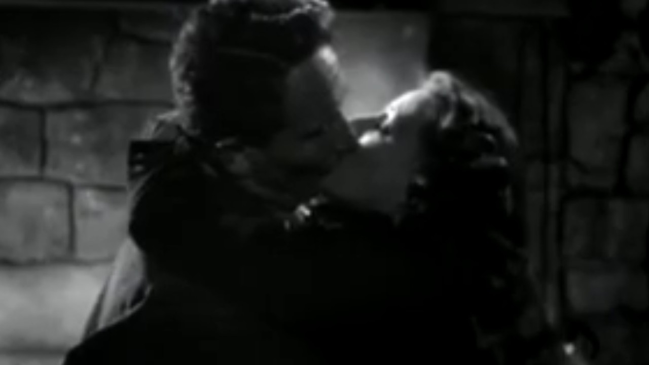 Spencer Tracy kissing Irene Dunne in A Guy Named Joe