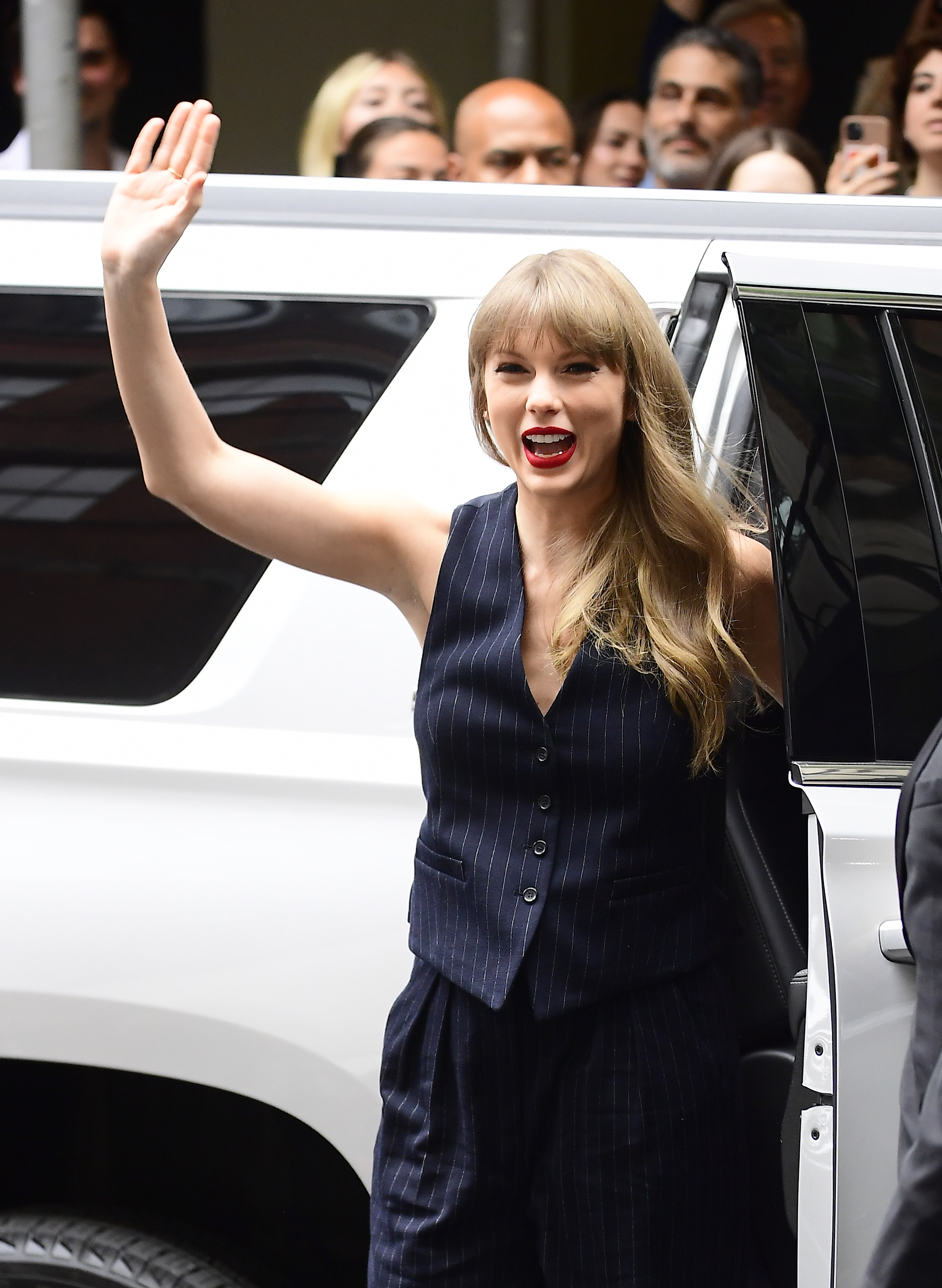 Taylor swift wears a waistcoat