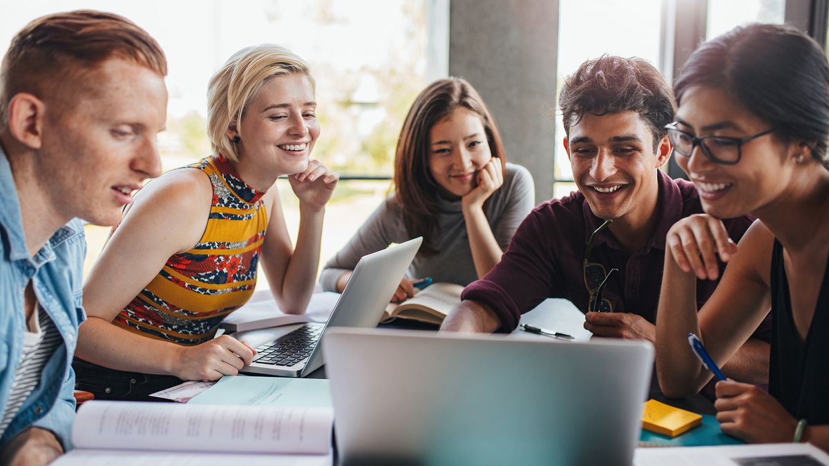 Students sitting around a desk