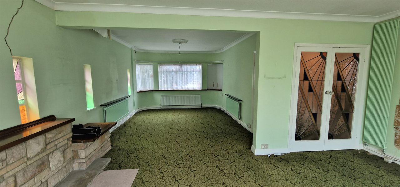 The spacious living room and dining area