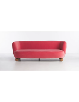Red '60s inspired sofa.