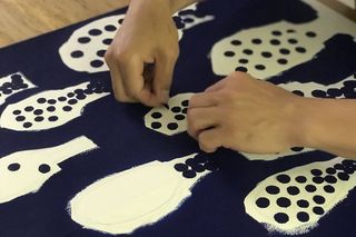 Fashion designer Akira Minagawa at work on his 'Cidre' pattern