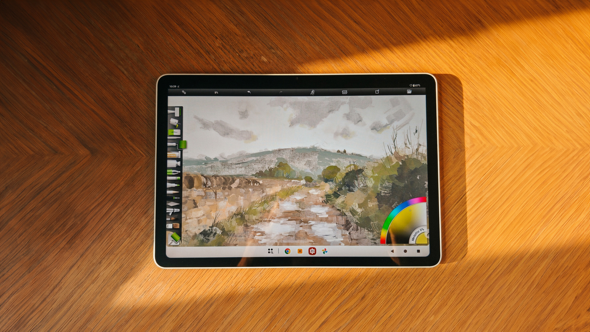 Photos of a white drawing tablet on a wooden table, the XPPen Magic Pro 13