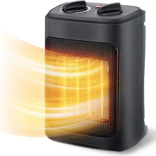 A black box space heater, lit up orange with 'waves' of heat emitted from the front. 