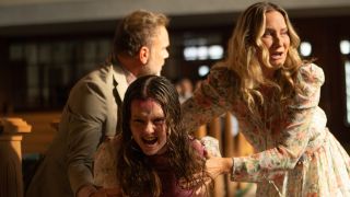 Tony (Norbert Leo Butz), Katherine (Olivia O’Neill) and Miranda (Jennifer Nettles) in The Exorcist: Believer
