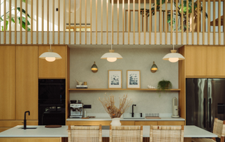 Kitchen with three pendants above island 