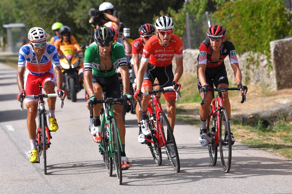 Ben King's former breakaway mates consider the chase during stage 9 at the Vuelta