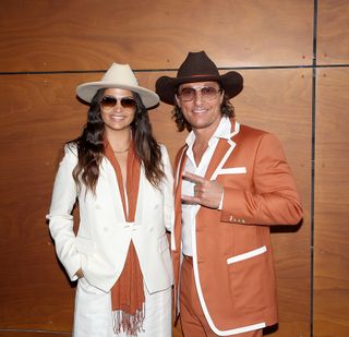 University of Texas Minister of Culture Matthew McConaughey (R) and Camila Alves McConaughey attend the ribbon cutting ceremony for University of Texas at Austin's new multi purpose arena at Moody Center on April 19, 2022 in Austin, Texas.