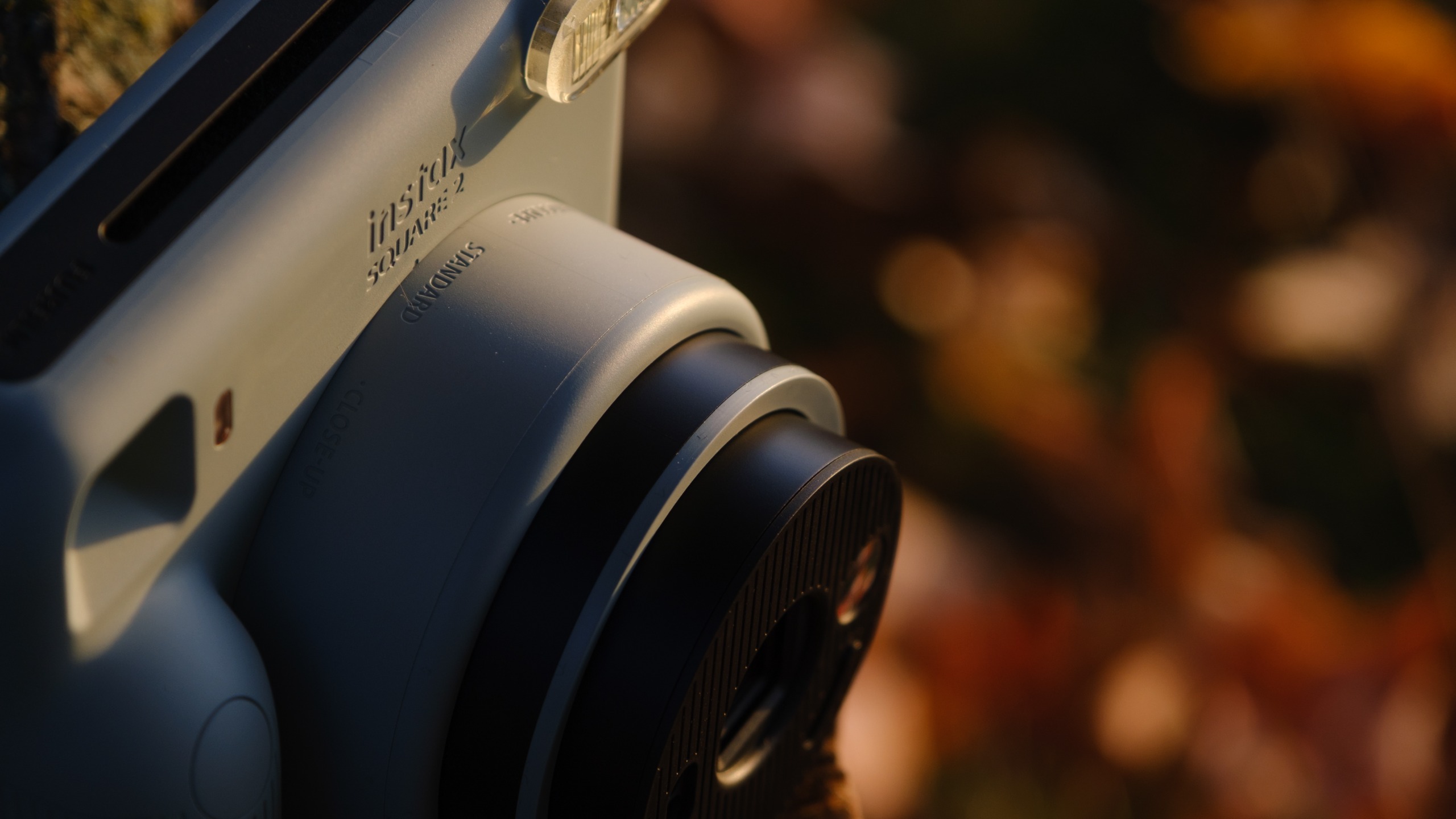 The Fujifilm Instax Square 2 camera photographed outside