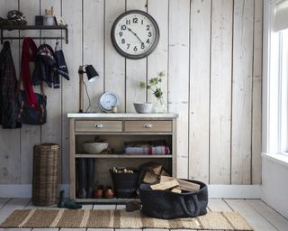 White wall paneled boot room by Garden Trading