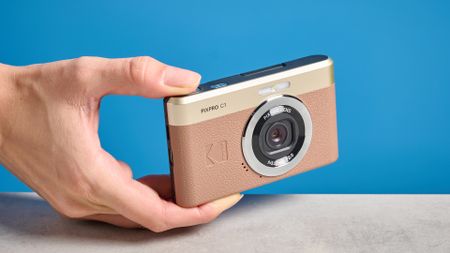 A brown Kodak PIXPRO C1