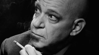 Chis Goss smoking a cigarette (headshot)