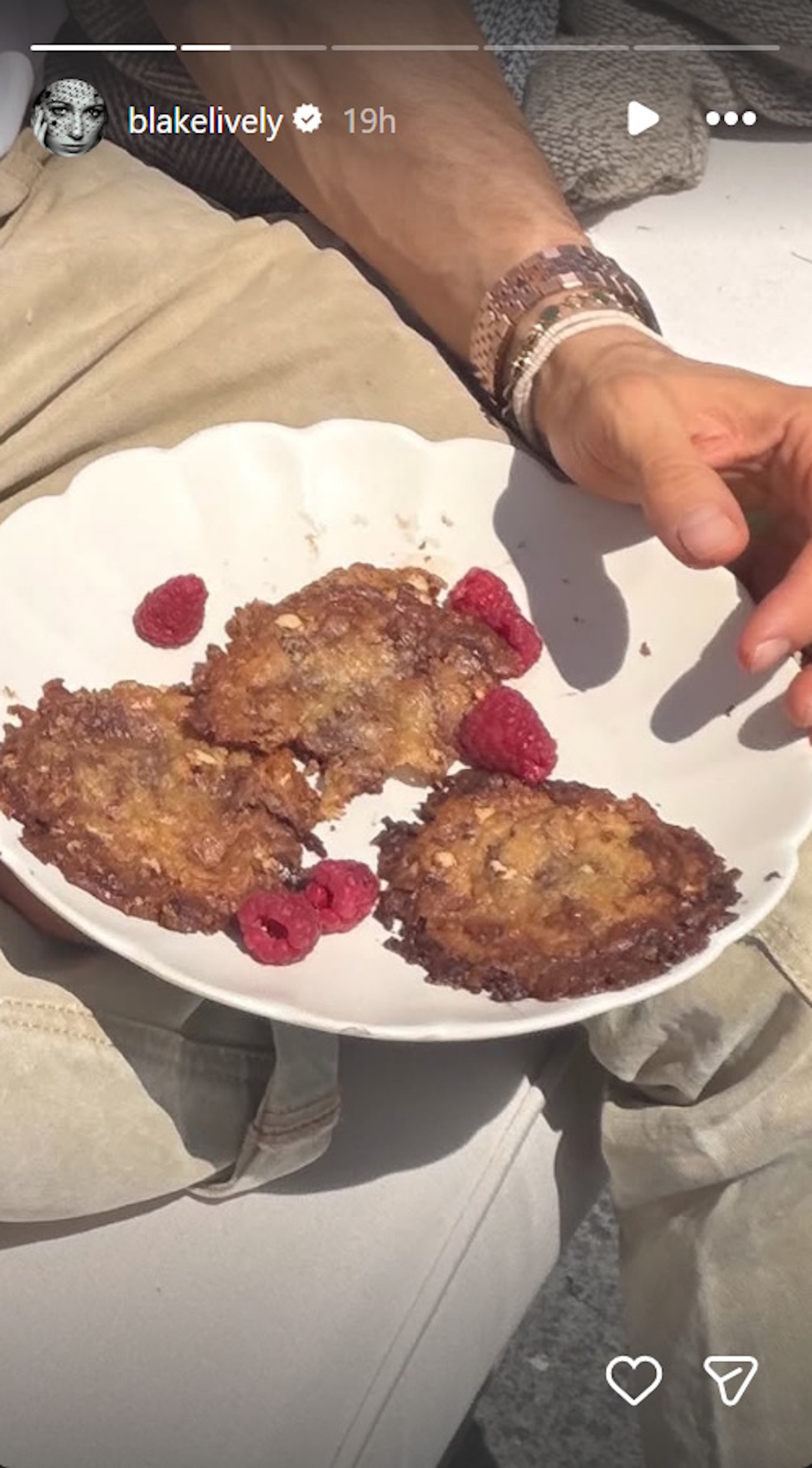 Blake Lively shares images of her and Ryan Reynolds and an unidentified plate of something with raspberries.