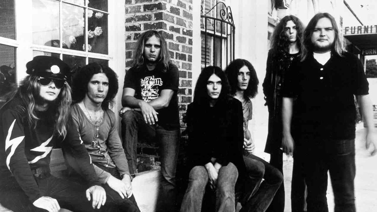 Lynyrd Skynyrd sitting on a wall in 1974