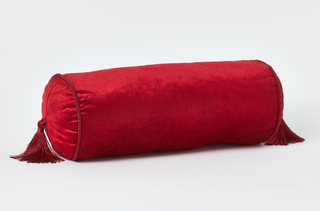 red velvet bolster cushion