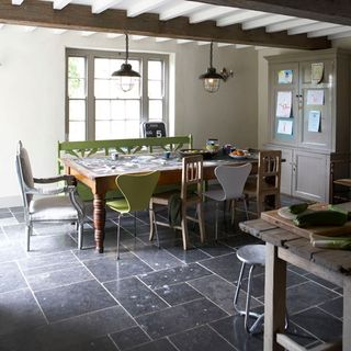 dining room with table and hanging lights