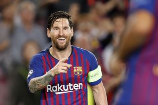 Lionel Messi celebrates one of his three goals for Barcelona against PSV in the Champions League in September 2018.