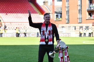 Leyton Orient manager Richie Wellens celebrating with the trophy after winning the league 2 during the Sky Bet League 2 match between Leyton Orient and Stockport County at the Matchroom Stadium, London on Saturday 29th April 2023. (Photo by Ivan Yordanov/MI News/NurPhoto via Getty Images)