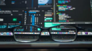 Glasses in front of computer screen