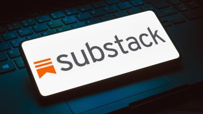 Substack logo is displayed on a smartphone screen