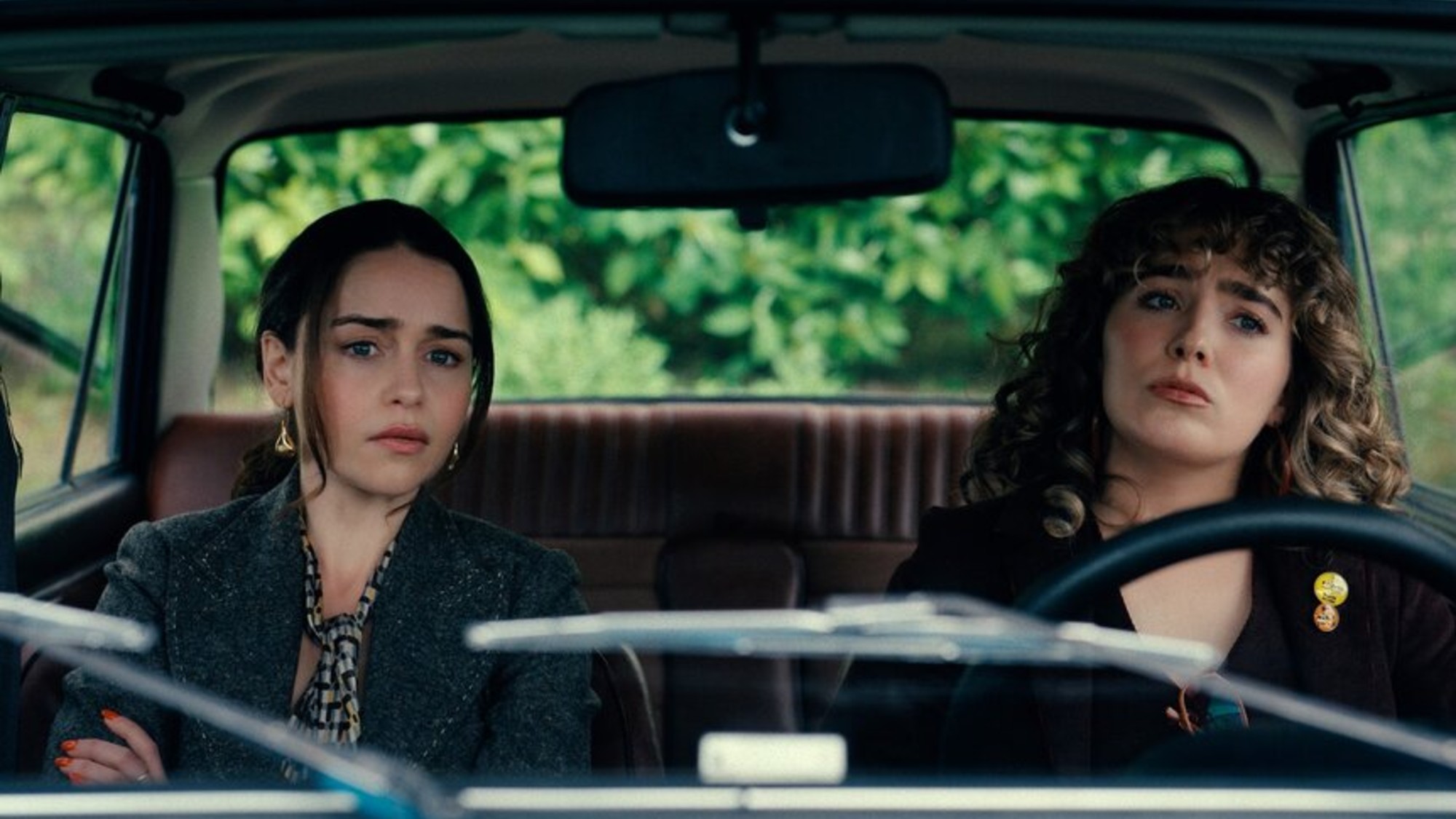 Bea (Emilia Clarke) and Twila (Haley Lu Richardson) appear on Ponies Season 1.