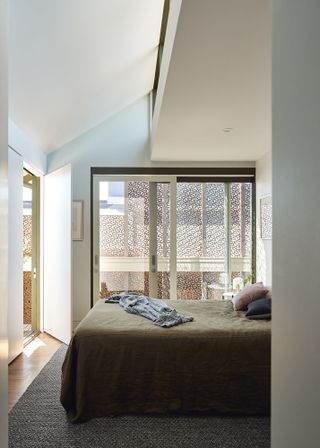 One of the bedrooms in the attic space of the old house