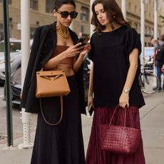 Two women looking at phone