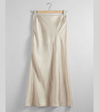 Image of silky cream skirt