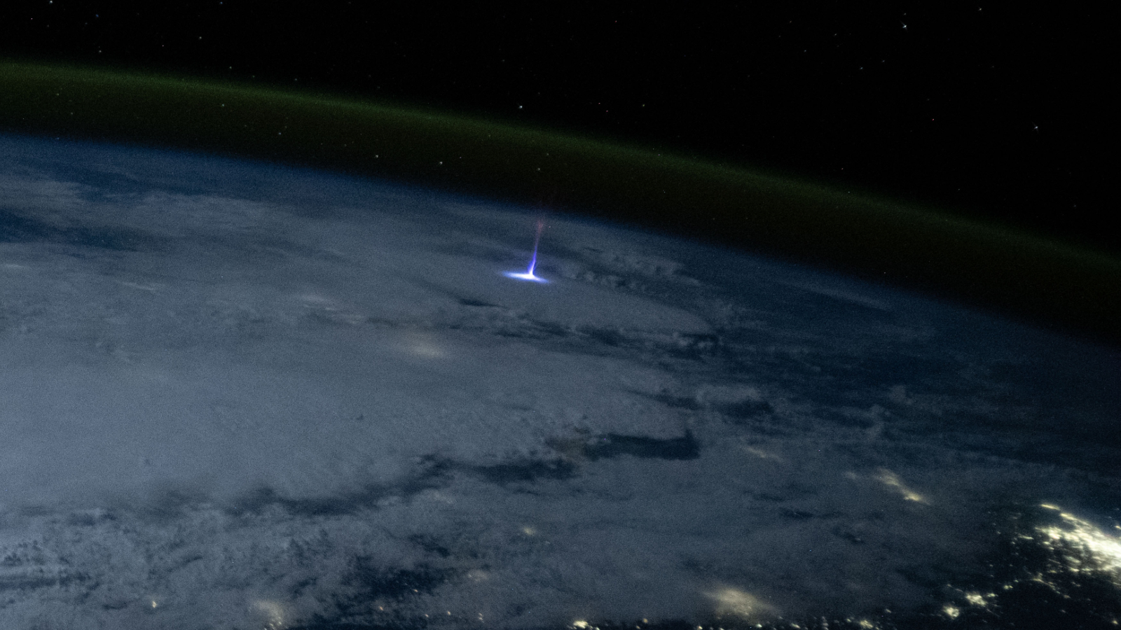 Spectacular photo taken from ISS shows 'gigantic jet' of upward-shooting lightning towering 50 miles over New Orleans